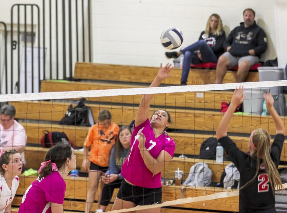 Malika Monroe #7 passes the ball back over the net in the Badger Tournament, held Saturday, October 14, 2022.