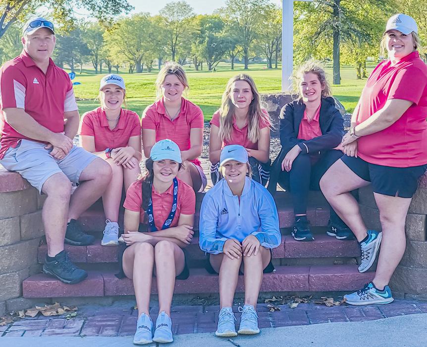 Pictured at NSAA State Golf are back row, L to R: Coach Muirhead, Kaylee Hanson, Jojo Jordan, Kaetryn Bancroft, MaryBelle Ward, and Coach Houdek. Front row, L to R: Mekallyn Bancroft, and Jaycie Cox.