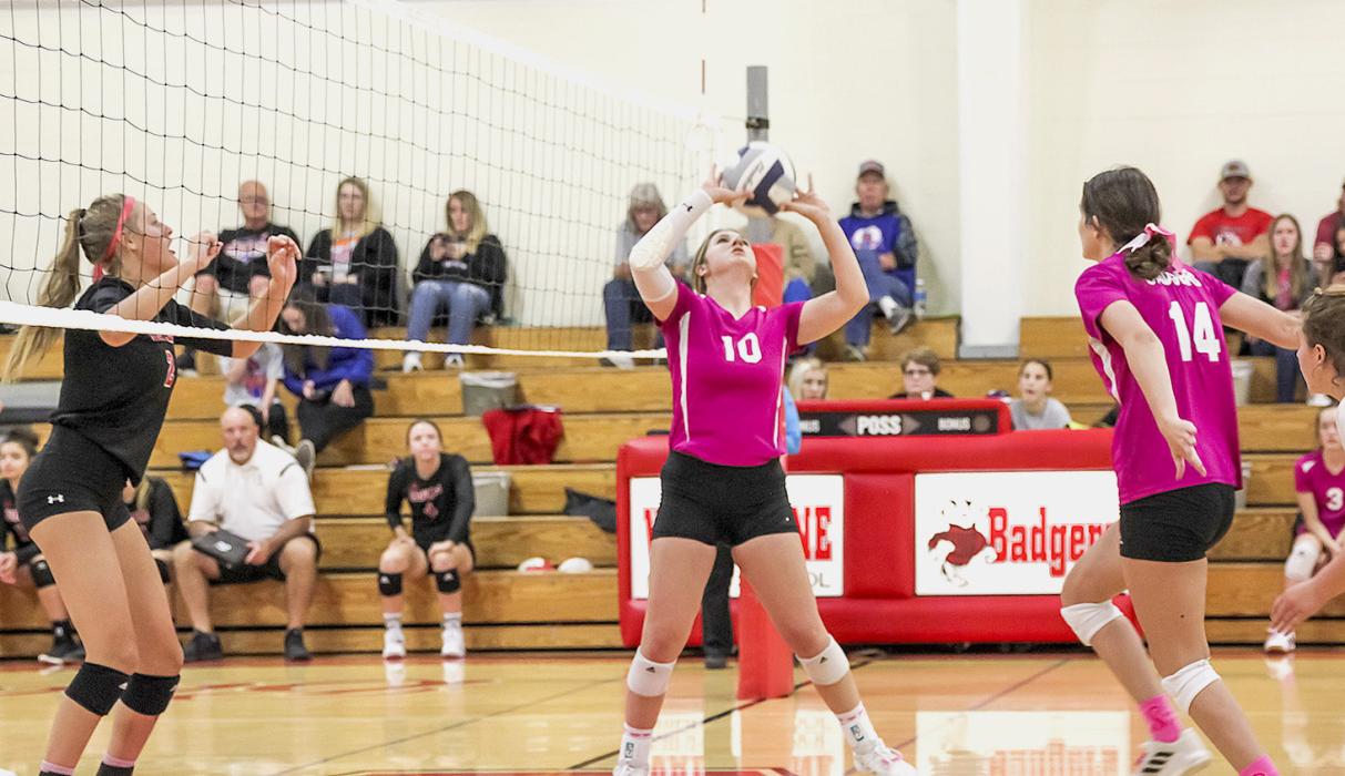 Kinsey Buechle #10 sets the ball for Lainey Egelhoff #14. Photos by Amanda Long