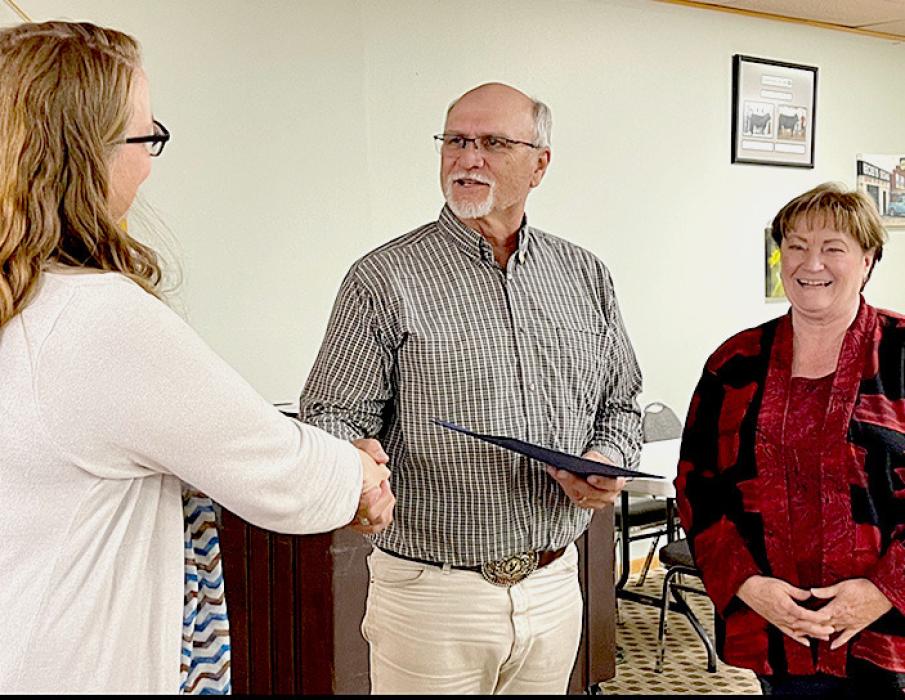 Pictured are Valentine Rotary Co-President Regina Osburn, Mike Burge, and Rotarian Ronna Morse.