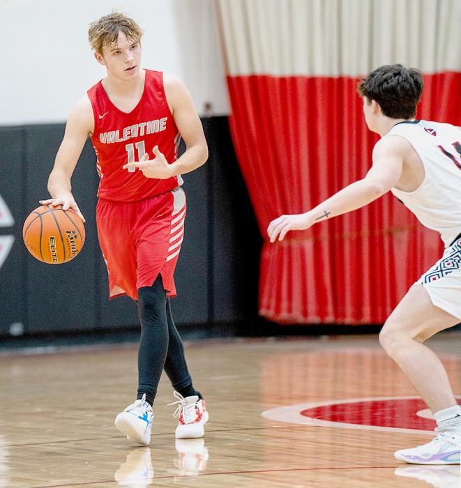 Lex Larsen #11 asks a pointed question, wordlessly in the game against Cozad. Photos by Fletcher Larsen