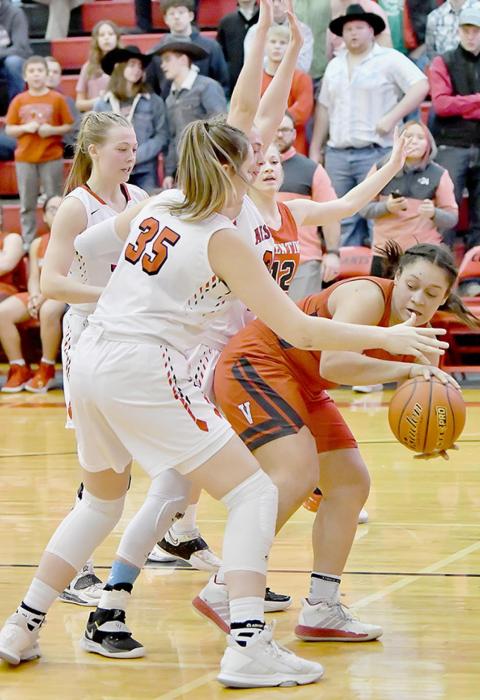 Malika Monroe gets trapped along the baseline by Ainsworth players and is able to dish the ball to a Valentine player.