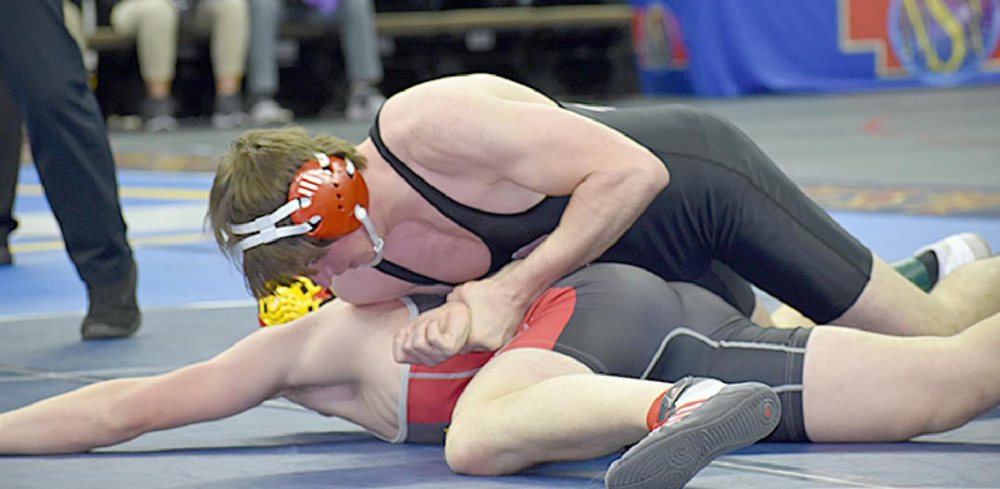 Wrestling at 182#, Tagg Buechle earned fourth place,