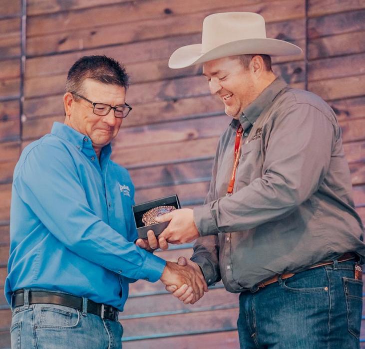 Past president Ryan Adamson presented Craig O’Kief, of Wood Lake, the Volunteer of the Year award.