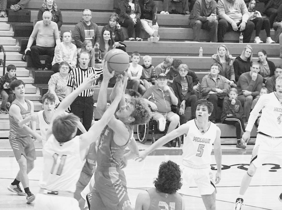 Grappling for the rebound in the game against McCook.