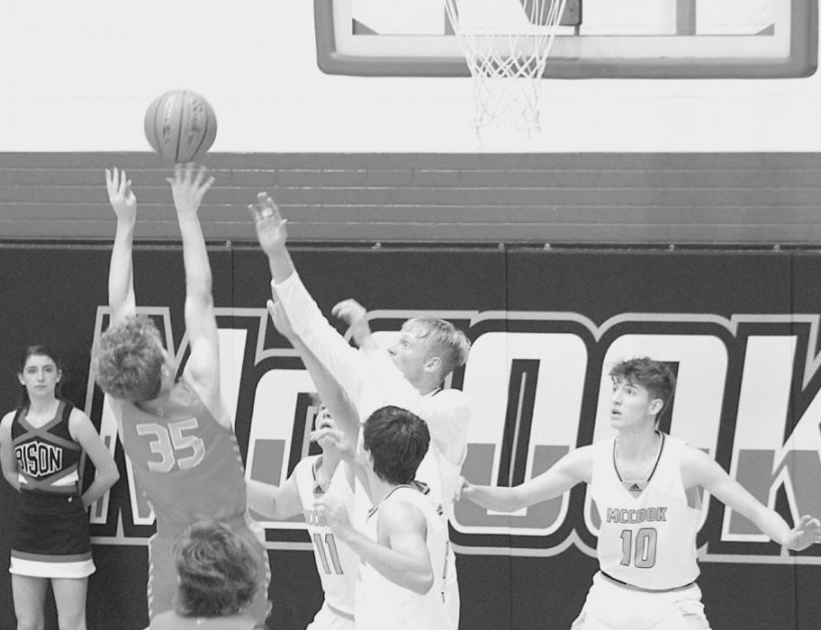 Lex Larsen taking shot under the hoop. Photos by Mary Reagle