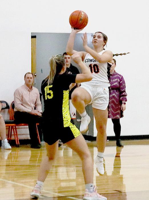 Rachel Farley #10 goes in for the layup against the Lady Hawks. Photos by Shontell Roseberry