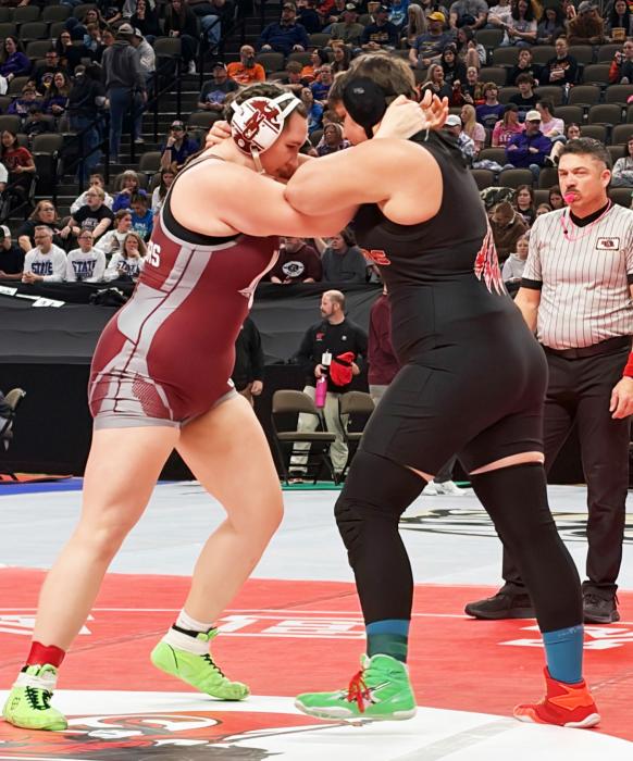 Addie Sexson ties up with her opponent in the 235#.