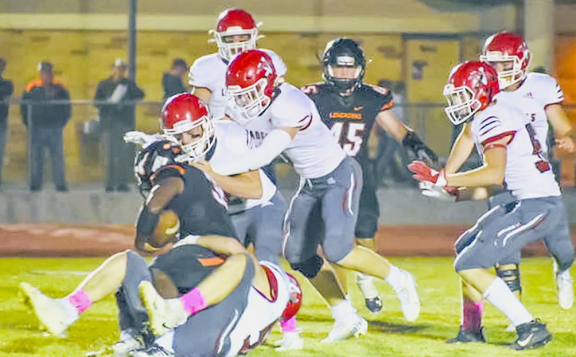 The Badgers get after Chase County’s ball carrier.