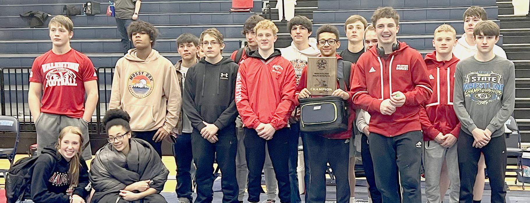 The Badger Wrestling Team took first place at Bartley. Pictured are from L to R: Clayton Elliot, Nick Ohlmann, Kadon Wenig, John Fulton, Cayden Lamb, Will Springer, Trace Buechle, Jekhi Williams, Gavin Sandoz, Cinch Miller, Ashton Lurz, Ethan Borer, Cooper Phillips, Louden Grooms. Kneeling, Managers Kaylee Hanson, Tatiana Williams. Photo by Jessica Stankoski