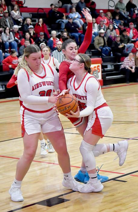 Alivia Patterson draws a foul when she tries to stop Painter from driving to the basket.
