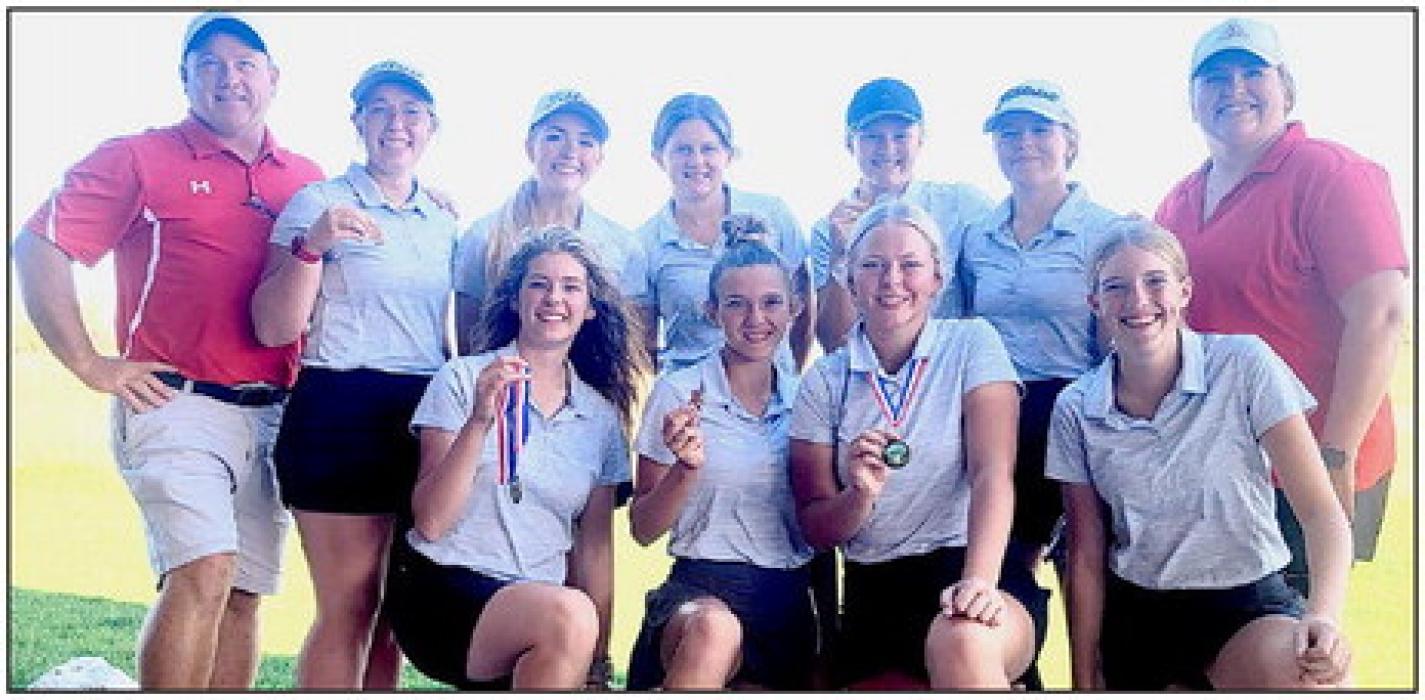 Pictured are back row, L to R: Coach Devin Muirhead, Kaylee Hanson, Rylee Ward, Jojo Jordan, Joni Cox, Tierney Miller, and Coach Houdek. Front row, L to R: Marybelle Ward, Kaetryn Bancroft, Grace Murphy, and Rylee Wackler.