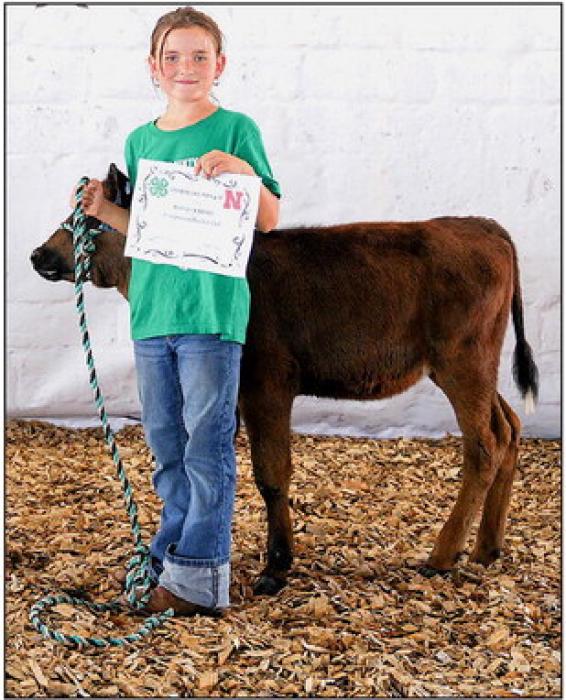 Ava Rahn, Champion Bucket Calf. Photos by Jennie Nollette
