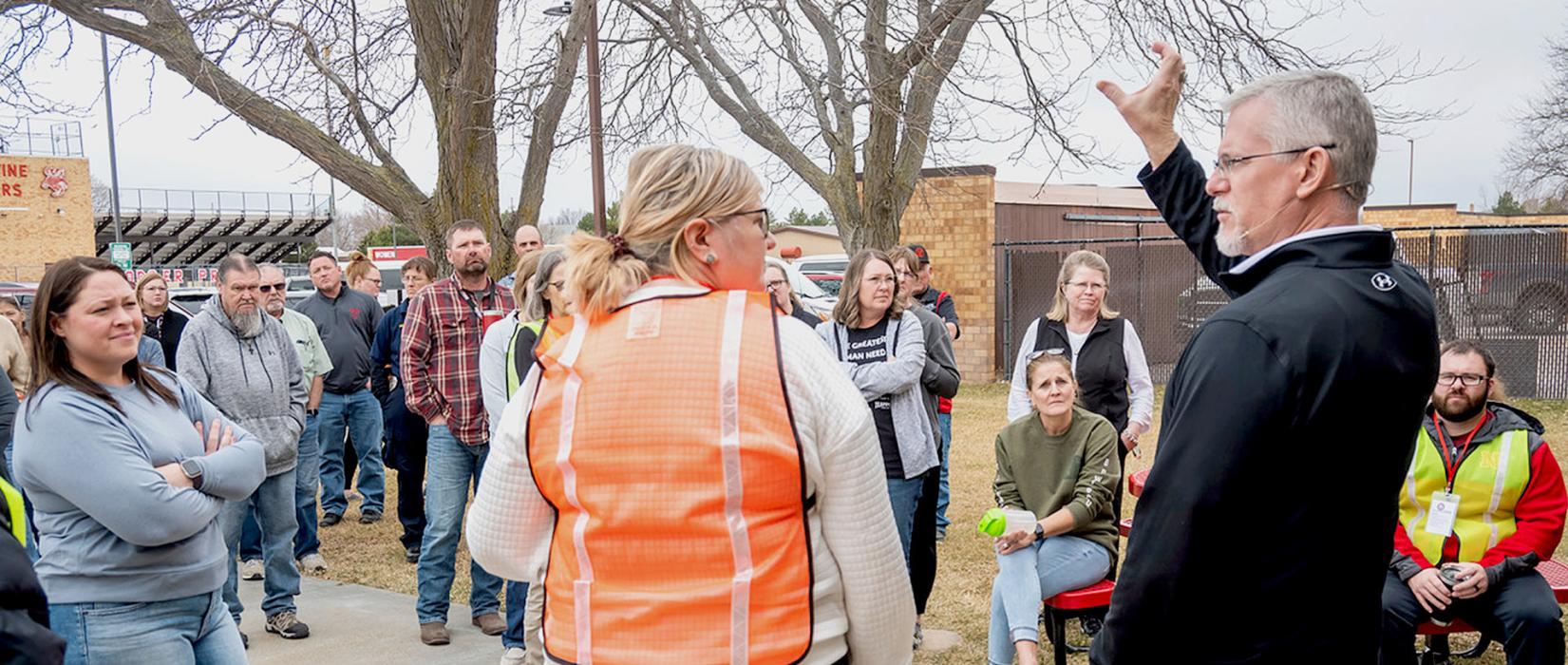After going through the live reunified training, faculty and trainers visited outside to share their findings and thoughts. Photo by Laura Vroman