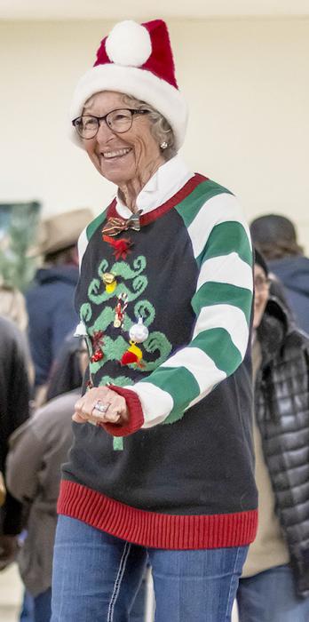 Shirley Kime wears her Sweater well and gets first place.