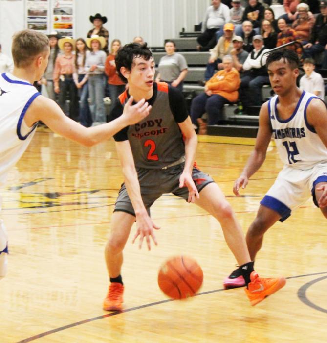 CK sophomore Teagen Fish #2 dribbles through Longhorn traffic during the subdistrict semi-final vs. Hyannis.