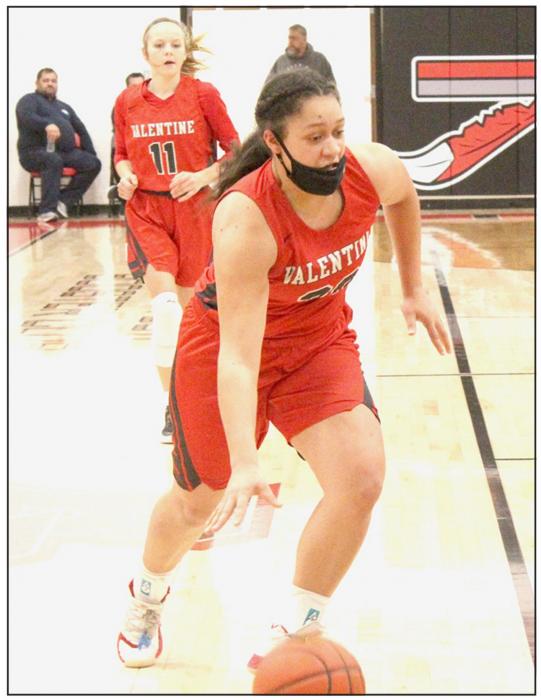 Malika Monroe dribbling down the court in the game against Broken Bow. Photo by Mary Reagle