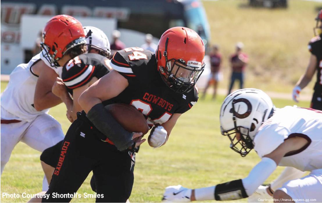 CK junior, Hesston Fay meets a Stuart defender during action against the Broncos at Cody Athletic Park. Stuart won 46-20. Photo by Shontell Roseberry
