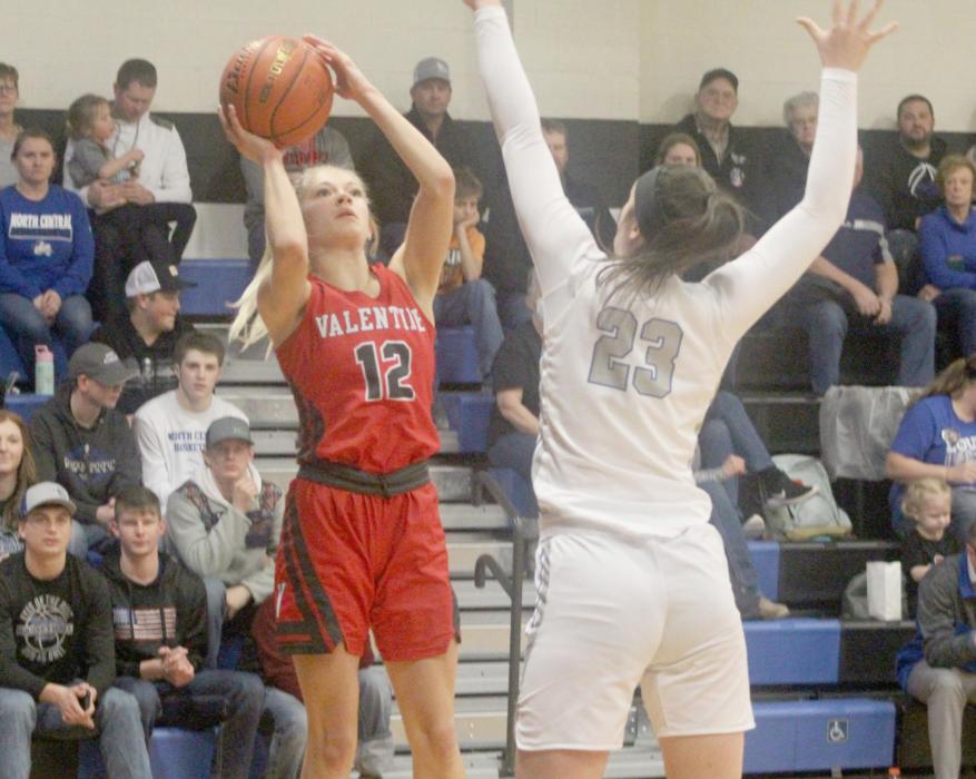 Kailee Kellum going up for a contested shot in the game against North Central, above. At left, Fayth From is under the hoop trying to get points on the scoreboard. Photos by Mary Reagle