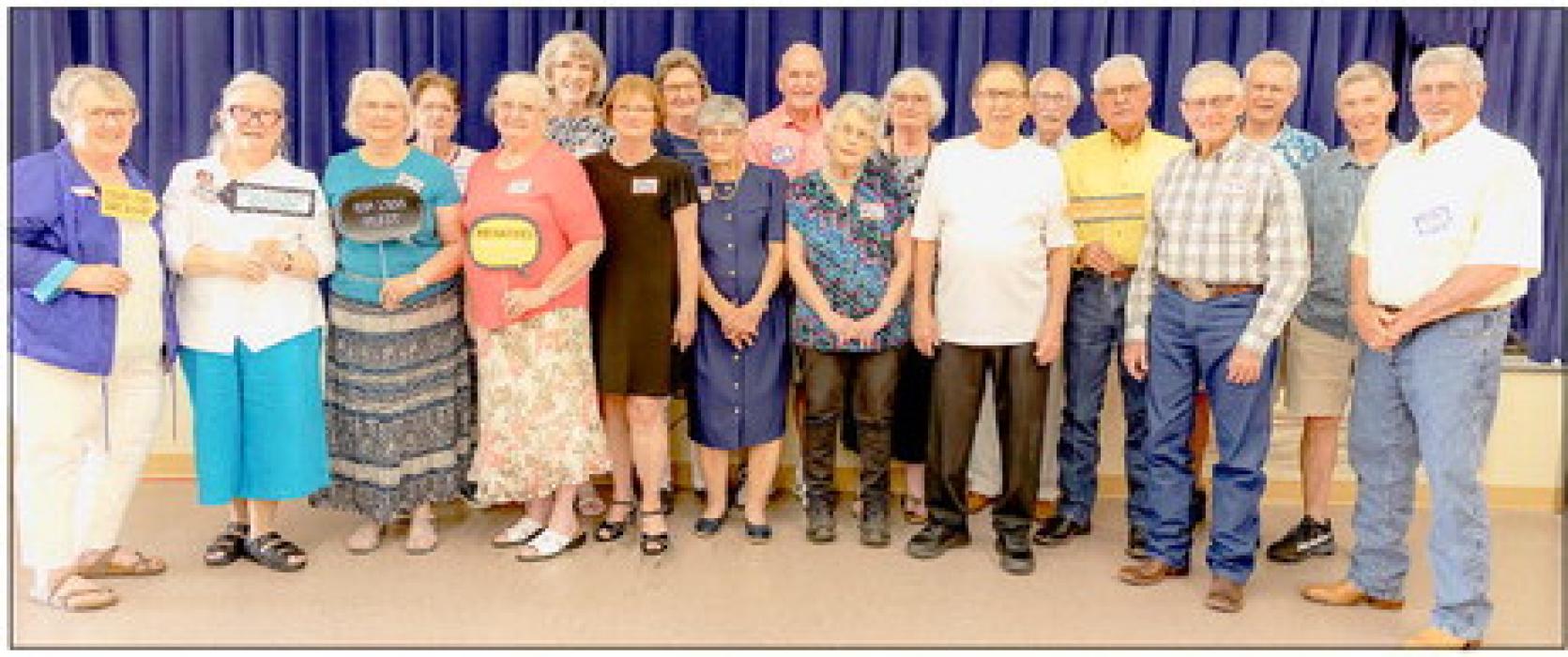 The VHS Class of 1963 are pictured from L to R: Arliss (Bowden) Allen, Merlene McAlevy, Judy (Charboneaux) Folsom, Sheila Carr, Charlene (Foster) Nielsen, Loree Hoisington, Patty (Schriner) Chicoine, Suzanne (Sears) Harms, Betty (Lien) Rodgers, Jack Wilson, Carolyn (Donoho) Harms, Shane (McLeod) Bush, Joe Liberator, Merle McAlevy, Larry Kluender, Tom Cox, Rick Dodson, Mark Mullin, and Bobby Lord. Not pictured were Sheila (Wuerth) Hays, Donna (Baker) Fickes, and Gale Hanson. Photos by Becky Wolfe