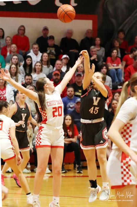Sophomore #45 Annalena Nelson jump shot.