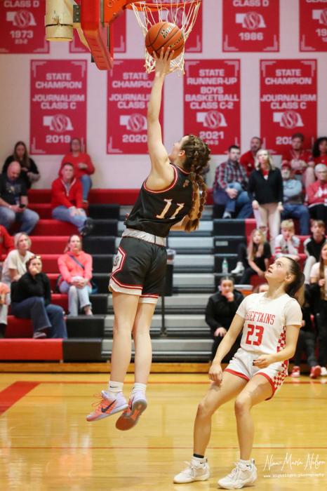 Junior #11 Paige Sprenger lay up.