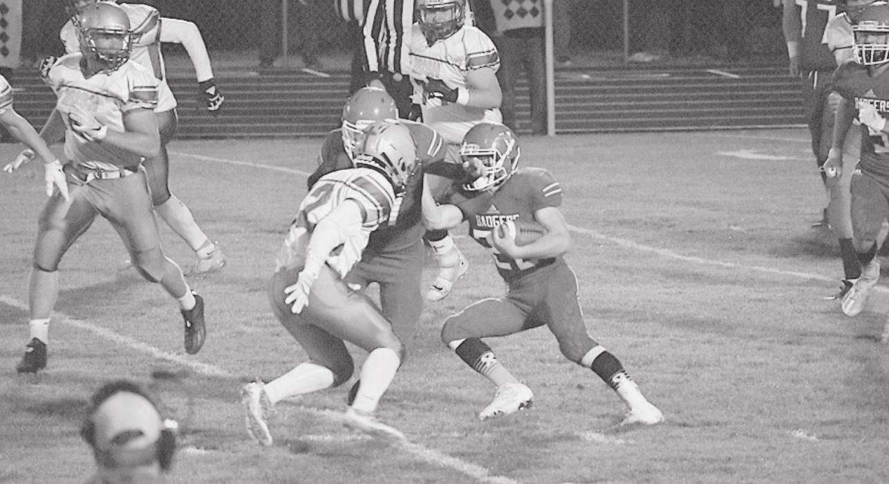Bryan Keller with a teammate try getting around St. Pat’s defense!