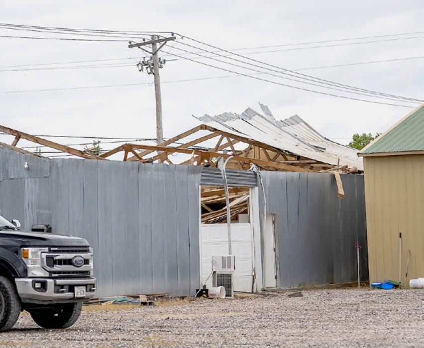 An example of 79 mph wind gusts vs. a metal roof when conditions are just right, located at E. B and Macomb Street.