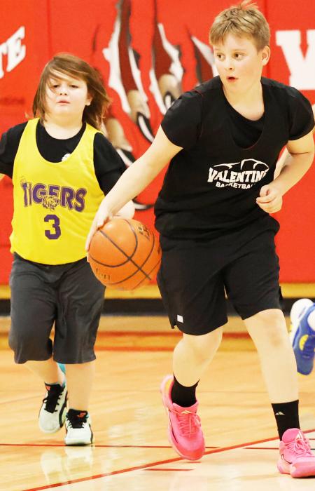 Dalton Graham moving the ball down the court.