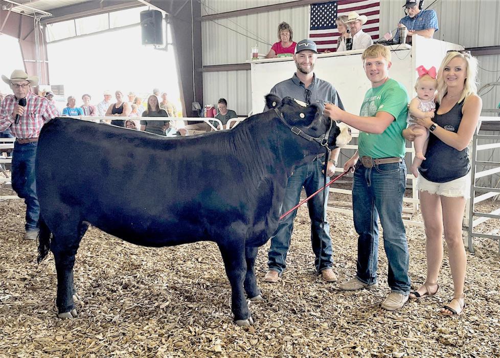 Reserve Champion Market Heifer owned by Dylan Naslund, purchased by Sandhills Family Dental for a $1,200 premium.
