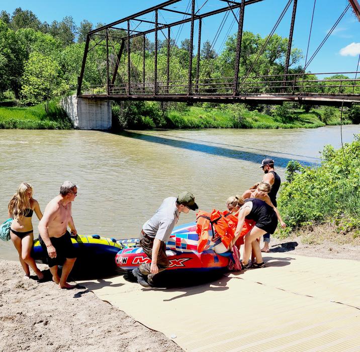 First group to use the new mats installed at the Brewer Bridge landing. Photo by NPS