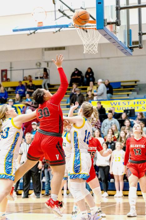 Malika Monroe shoots for 2 in the game against West Holt.