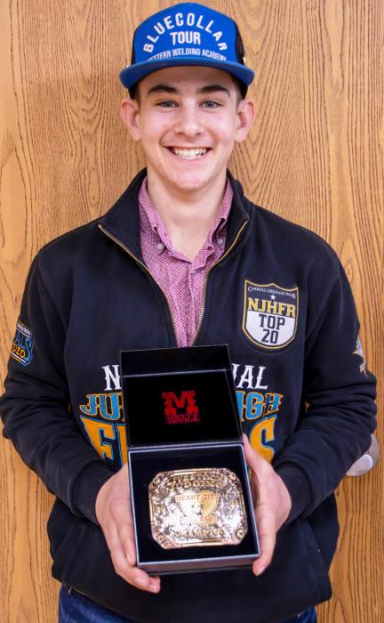 Treven Kenner, a Valentine FFA student, presenting his new buckle!