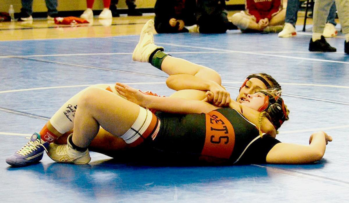 Ariana Blume competed in the 125# weight class and placed fifth at the Winnebago Invite. Photos by Robbie Blume