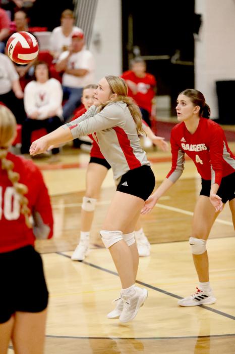 Cadence Swanson #8 libero passing the ball in the Lady Badger triangular.