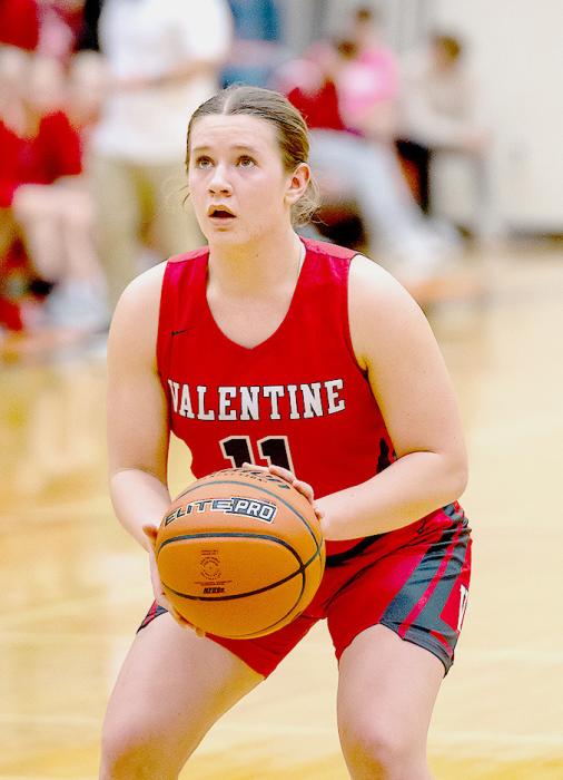 Kimber McGinley pauses before taking a shot! Photo by Kris Larsen