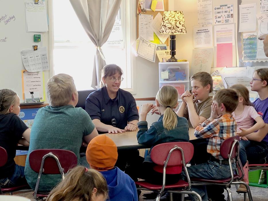Without a doubt, Valentine Police Chief Dana Miller is passing along sage advice for the youth of Simeon and Cutcomb Schools. She has the students enthralled as she shares portions of police work.
