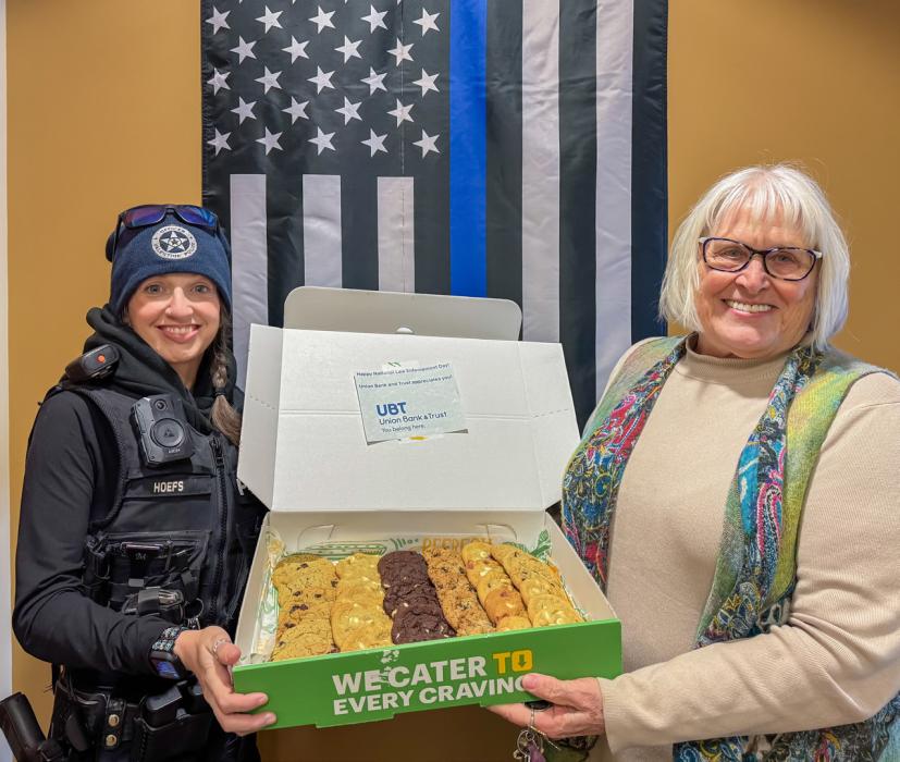 Nadeane Allard of Union Bank delivered cookies to Jasmine Hoefs policewoman of Valentine Police Dept for National Law Enforcement Day!