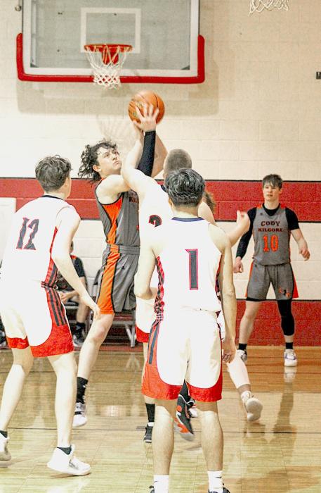 Cody-Kilgore’s Drew Farrell #5 puts up a tough shot through the Minatare defense Saturday, February 4, 2023. Photo by Shontell Roseberry
