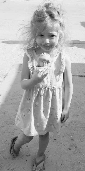 Pictured at right, Liberty Dean and her yummy but messy Frosty Drive In ice cream cone.