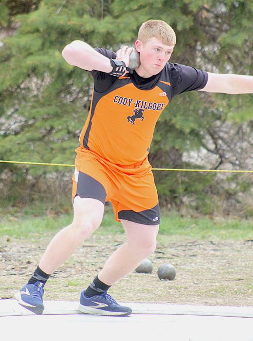 Dylan Naslund throwing the Shot Put. Photos by Shontell Roseberry
