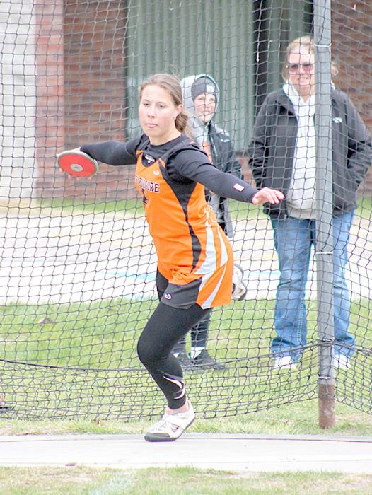 Urte Noreikaite throwing discus. She broke the school record at the Chadron meet, throwing 115'.