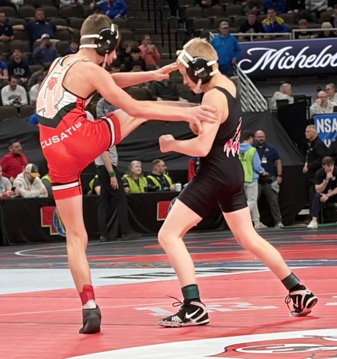 Brayden Stec goes for a takedown. Photos by Lorana Eggert