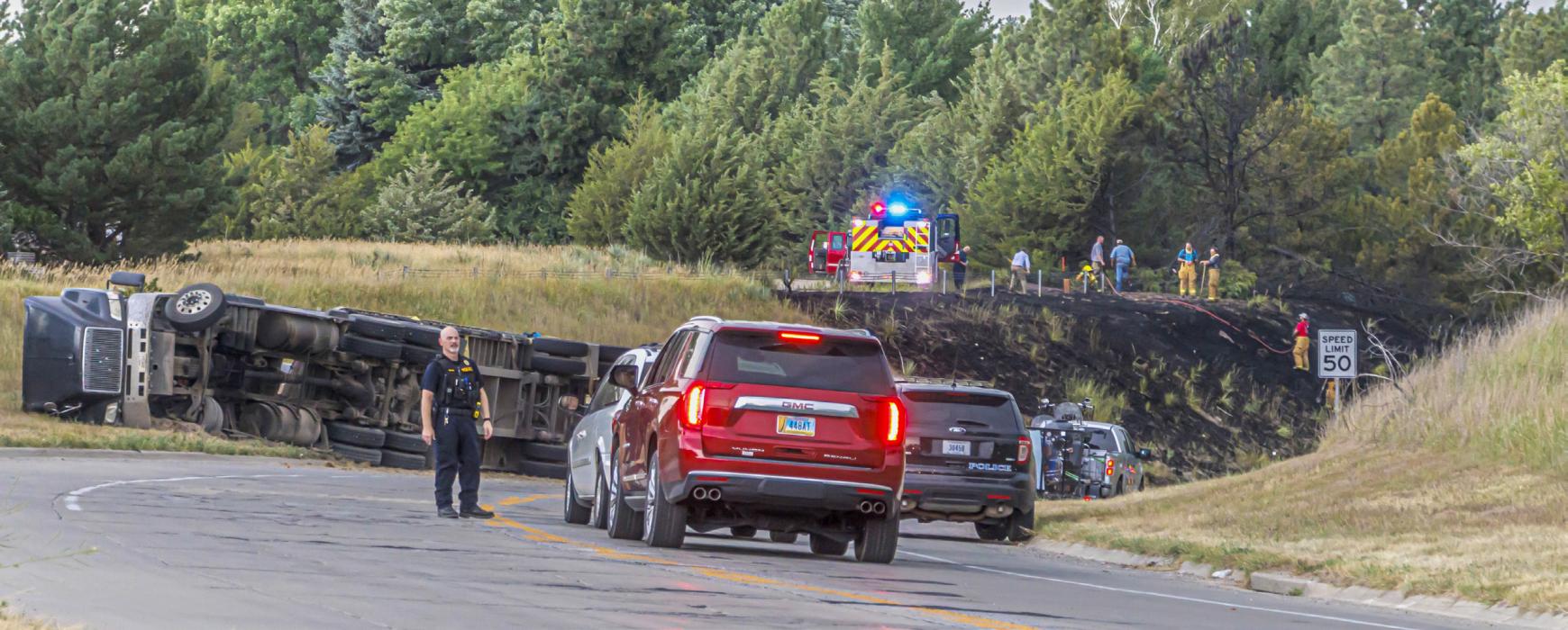 An accident occurred on North Highway 83, Thursday, August 4, 2022 which began a series of fires that area firefighters spent over 20 hours manning. Photo by Laura Vroman