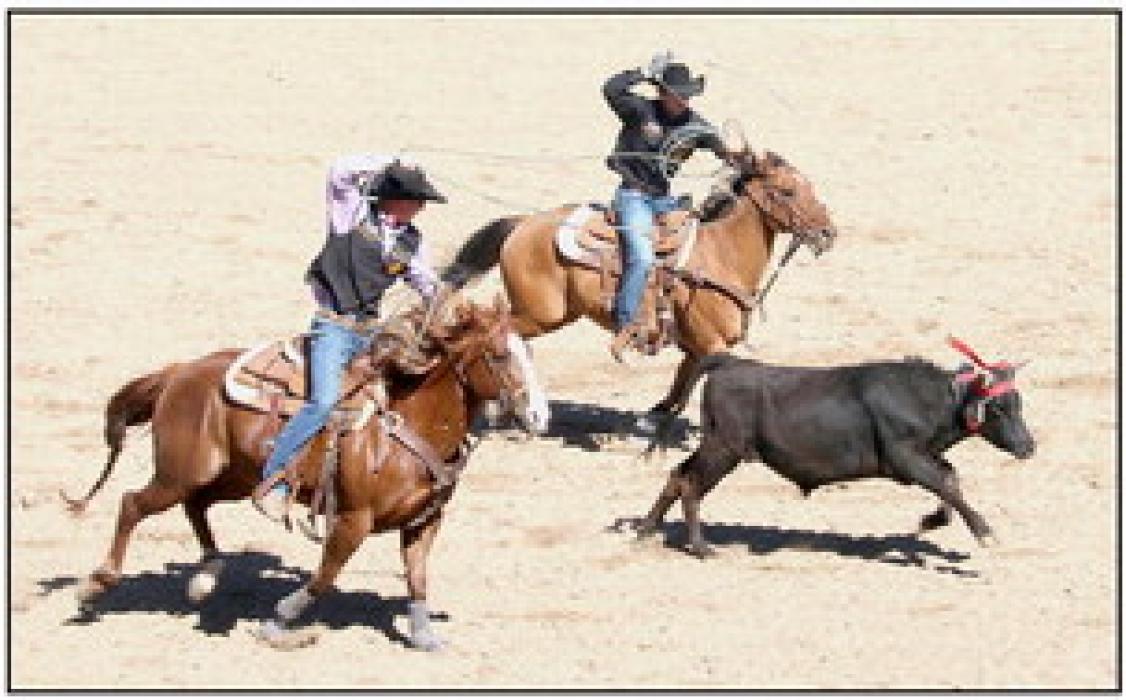 Carter Anderson of Gordon, and Sage Shrunk of Valentine, winners of the team roping at the Chadron State College rodeo. Photos by Con Marshall