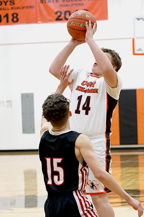 Blake Lancaster shoots from behind the arc Saturday evening. Photos by Shontell Roseberry