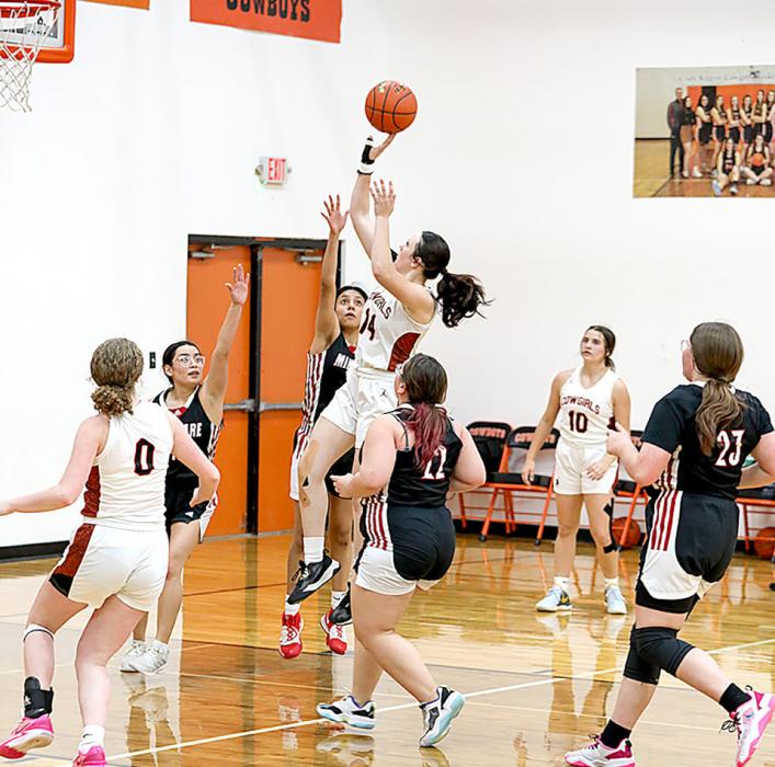 Mikah Vander Wey puts up a two point shot against Minatare.