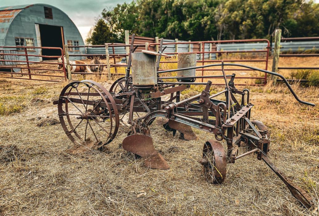 A long forgotten planter, once covered in sand, reminds us of the hard work, and dedication it takes to feed a nation. Photo by Tina Boone