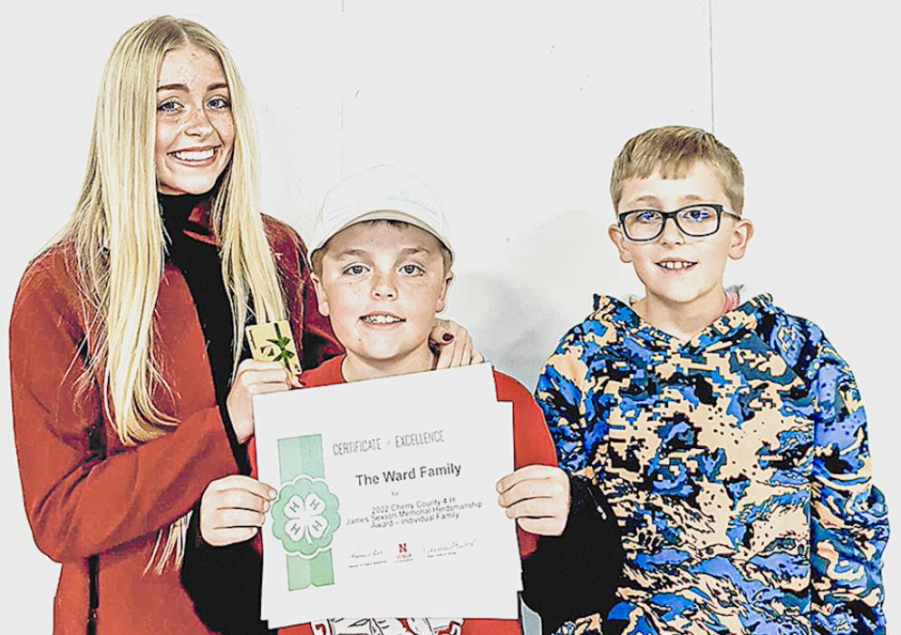 Rylee, Tate, and Rhett Ward received the James Sexson Memorial Herdsmanship Award, Individual Family.