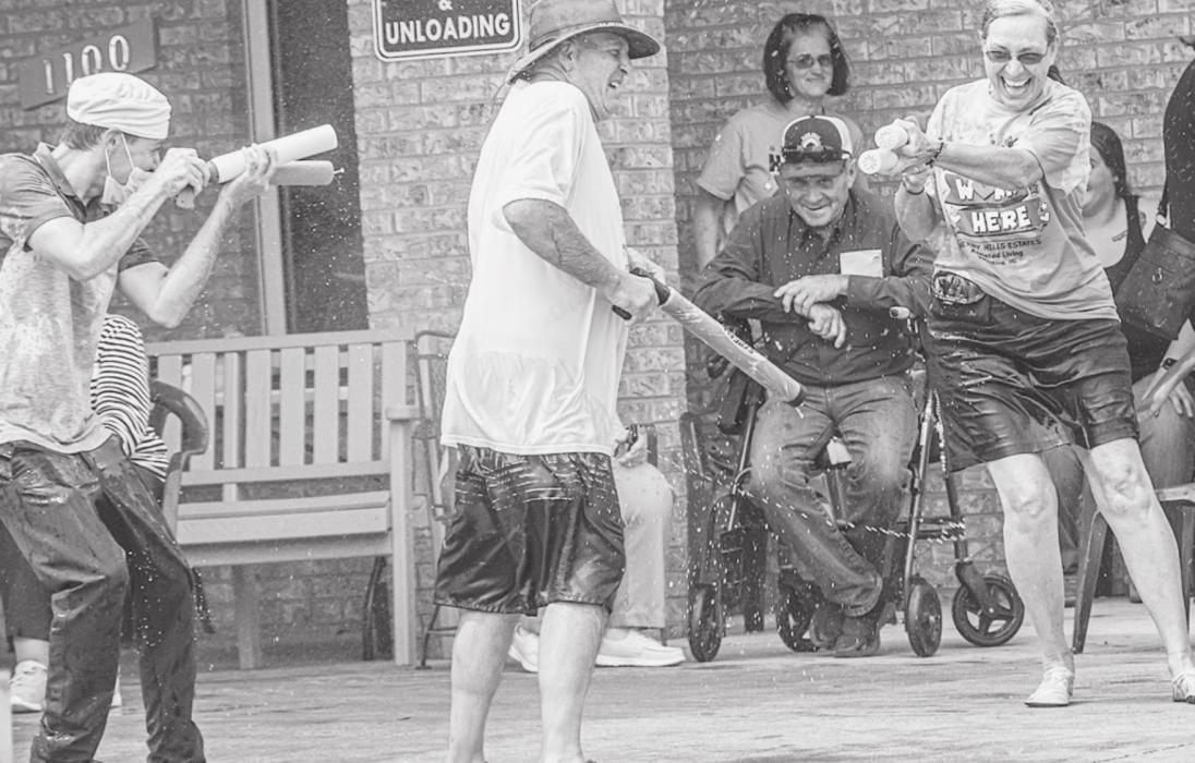 The water fight is on!!! Mitchell Elliott Director of food services shooting Gary Coleman maintenance and it’s Sally Conner comin’ around with a double shooter. Photos by Laura Vroman